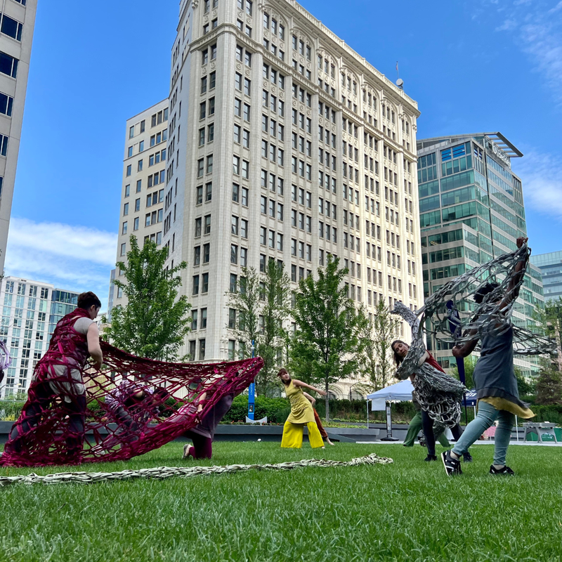 Textile Dances is performed on green space downtown.