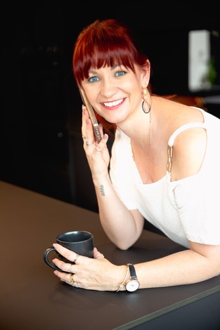 Bree Stedman, women's emotional breakthrough specialist and author of Own Your BS®, based in Newcastle NSW Australia, on phone