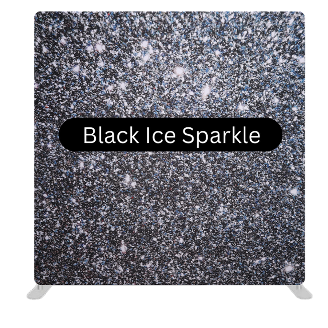 A photo booth backdrop featuring a dense black surface covered in shimmering silver and white sparkles. The texture resembles glittering ice crystals scattered across a dark background, creating a sleek and elegant look for event photos.