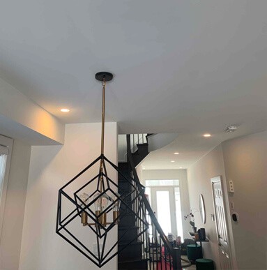 This is a flat drywall ceiling repair result in a contemporary home with beautiful lighting in Vaughan