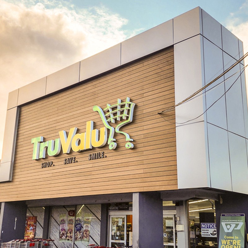 Oblique angle shot of a supermarket showing new facade at front of the building.