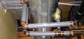 Poly B pipe around HVAC in basement in Kanata