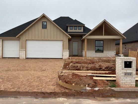 Preview the future 10308 SW 50th custom home — a stunning 4-bedroom design with vaulted living spaces and timeless curb appeal.