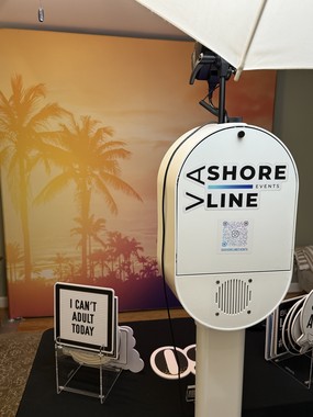 Virginia Beach House Party Photo Booth for 60th birthday with Miami sunset backdrop.
