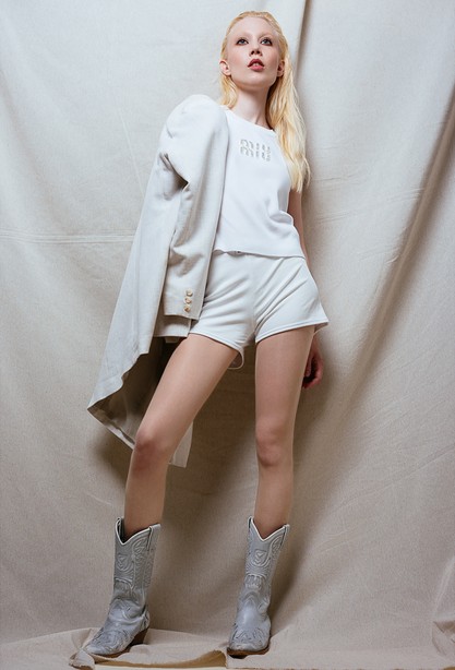 Finnish model Oona-Emilia Enkelsaari. Editorial Miu Miu studio photoshoot.