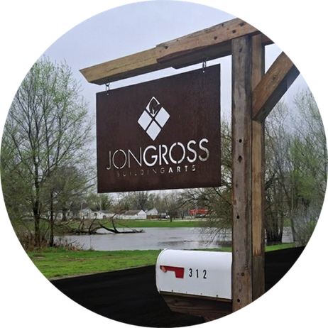 Jon Gross Building Arts metal logo sign.