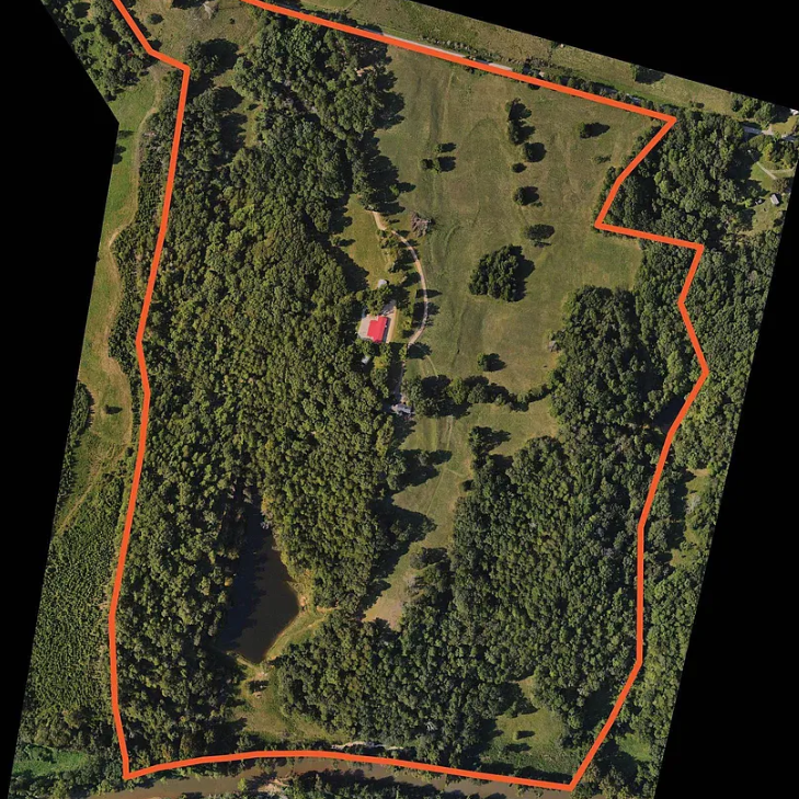 Aerial map showing the approximate property lines of the 127-acre campus, including the riverfront access and forested areas
