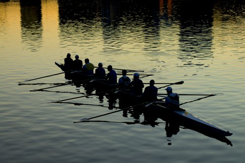 A crew of paddlers on the water.

Photo by Mitchell Luo on Unsplash