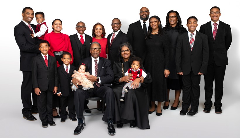 Apostle Tommy E. Quick Family posing for a photo