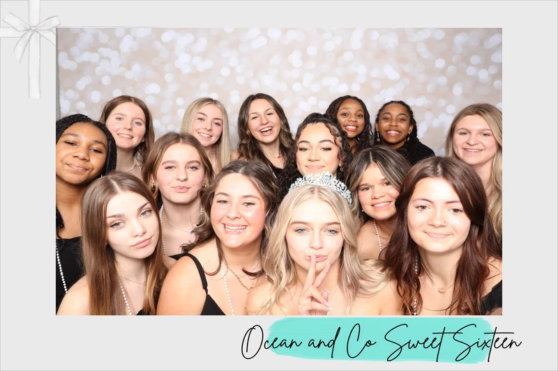 A group of teenagers smiling together in a photo booth at a Sweet Sixteen celebration in Virginia Beach, standing in front of a soft bokeh backdrop with a custom event border and the event title “Ocean and Co Sweet Sixteen.”