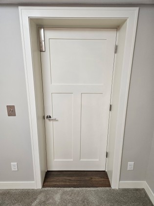 Home elevator door with opener.