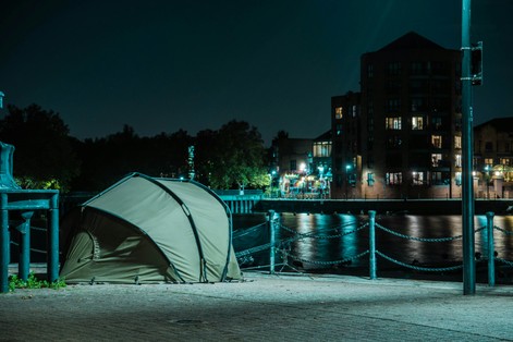 A tent situated in an urban environment.

Photo by Miquel Parera on Unsplash