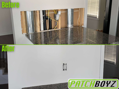 Drywall at the kitchen counter revealing HVAC and electrical