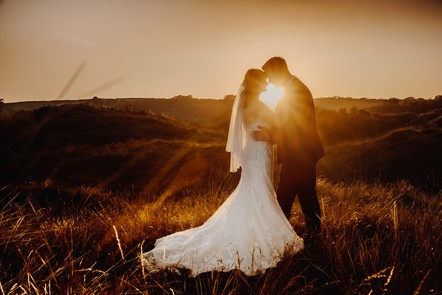 Relaxed sunset wedding portrait photography in the Gower, South Wales.