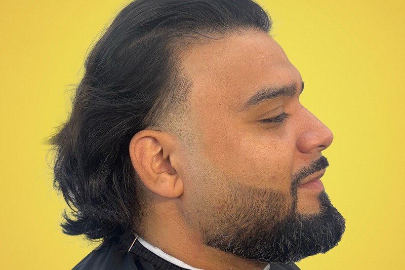 Sharp and stylish—fade and beard by Barber Boris, only at Bottima Barbershop.