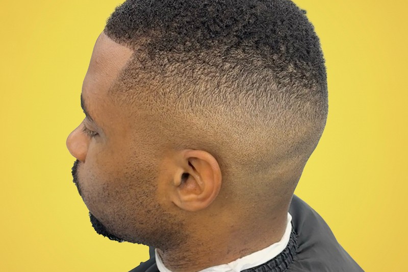 A clean gentleman’s fade crafted by Barber Boris at Bottima Barbershop.