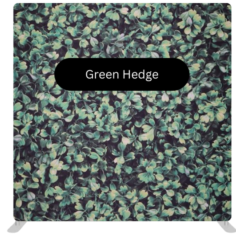 Green hedge photo booth backdrop featuring dense greenery, perfect for garden weddings, outdoor receptions, and romantic events.