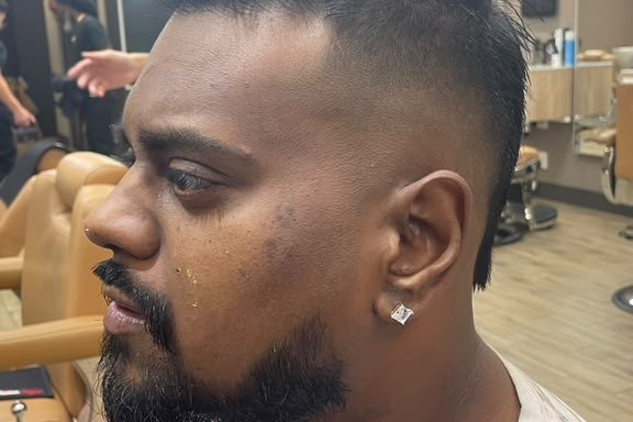 A clean gentleman’s fade crafted by Barber Boris at Bottima Barbershop.
