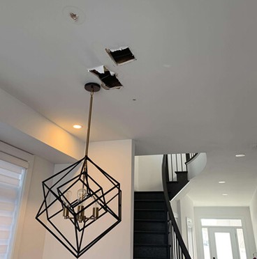 This is a flat drywall ceiling repair done in a contemporary home with beautiful lighting in Vaughan