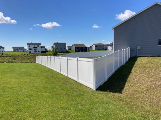 Vinyl fence installation.