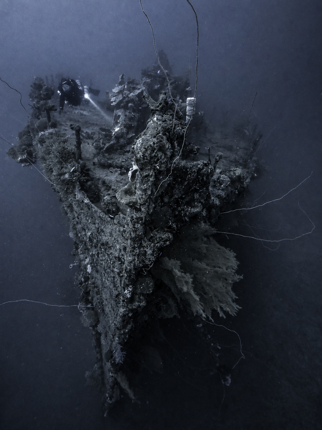 Technical cave divers underwater