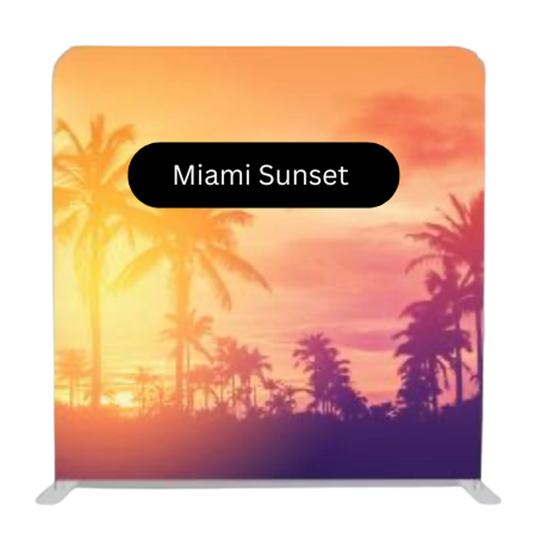 Tropical sunset photo booth backdrop featuring palm trees and warm gradient colors inspired by Miami evenings and beach celebrations.