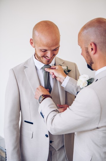 groom on the morning of his wedding