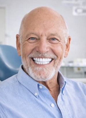 Best dentist in mexico for dental implants in 2026. Gentleman smiling after full mouth dental implants price
