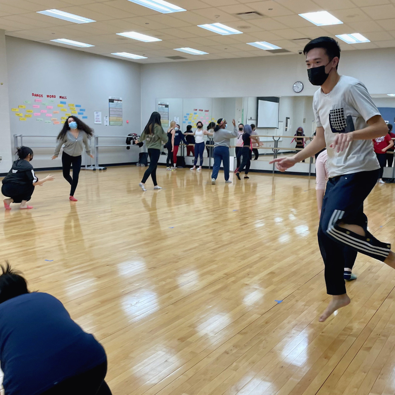 Tim and students move in motion in the dance room at Jones College Prep.