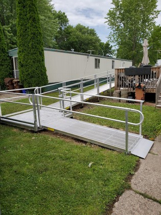 Metal wheelchair ramp installation.