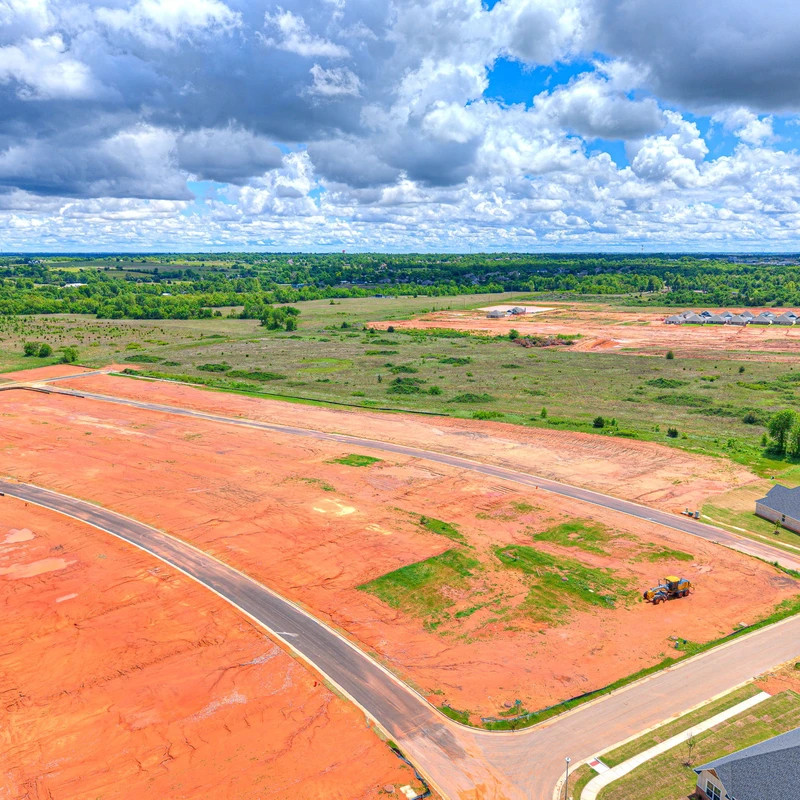 High aerial drone view of Canyon Ridge Phase 2 available lots in Mustang Oklahoma.
